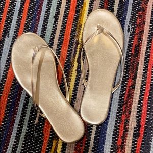 gold flip flops